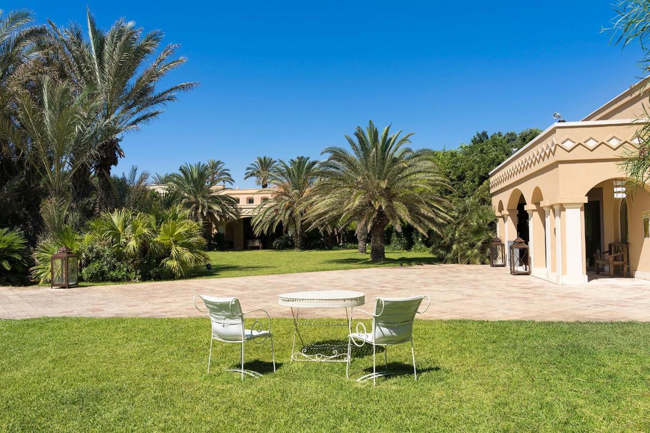 Romano Palace Luxury Hotel Catania Esterno foto The hotel's gardens