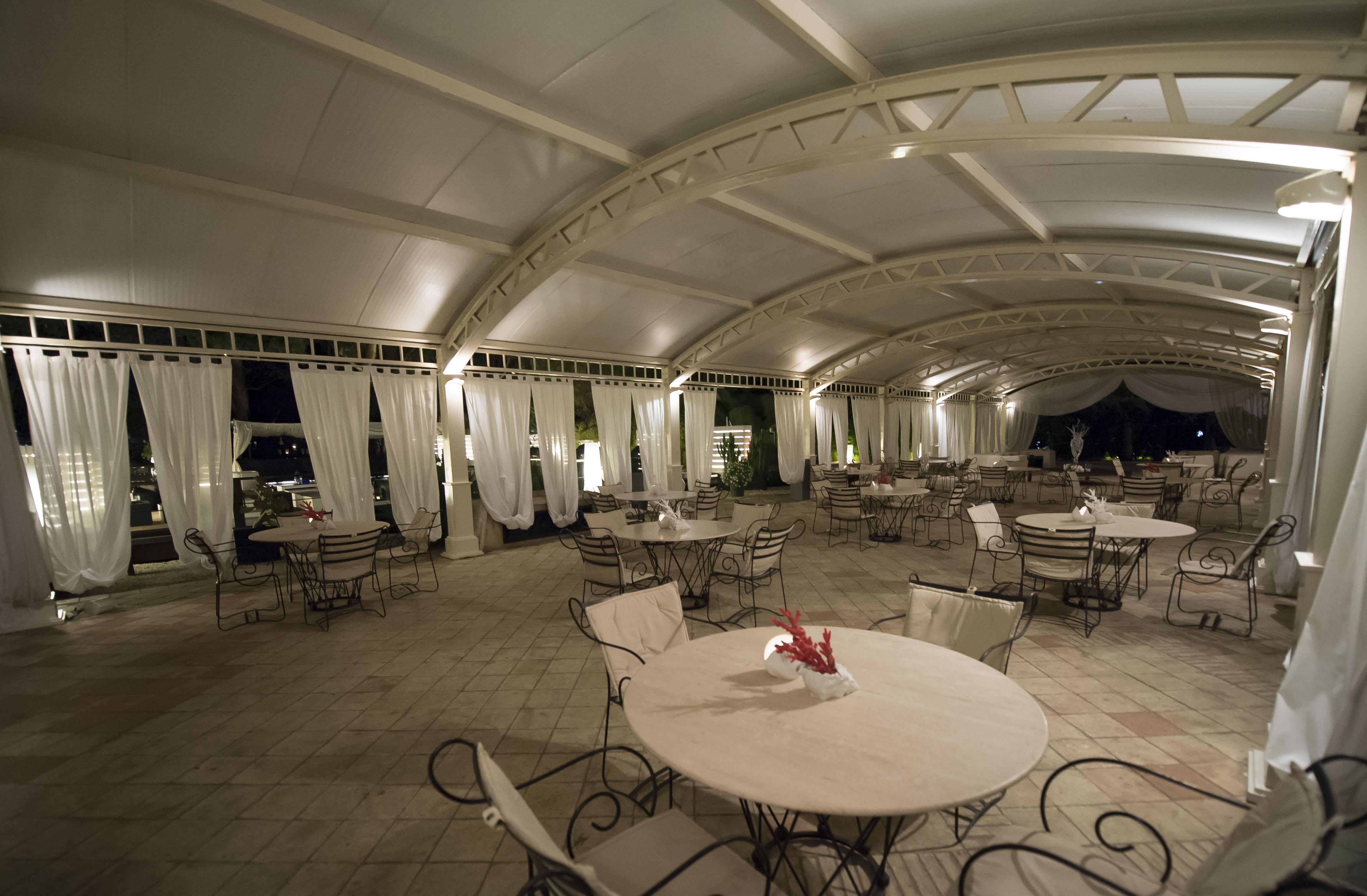 Romano Palace Luxury Hotel Catania Esterno foto The interior of the restaurant